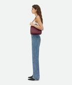 Adriana woven vegan leather tote handle detail