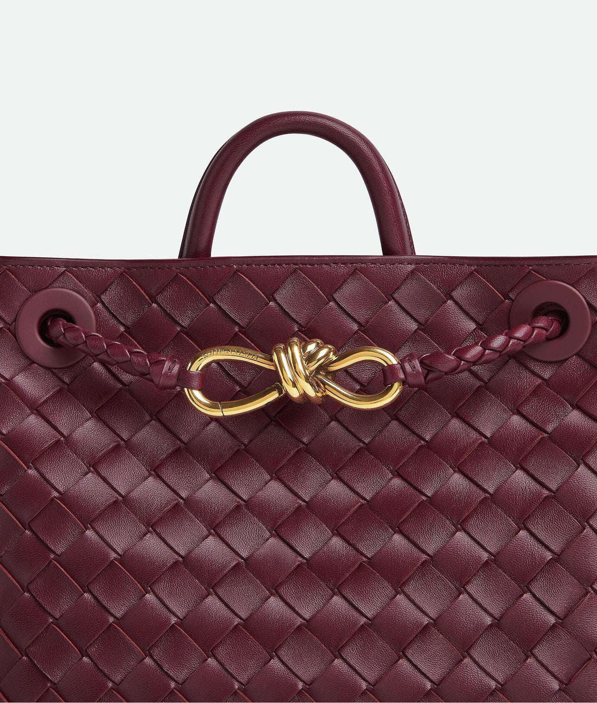 Adriana woven tote carried on the shoulder