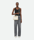 Adriana woven vegan leather tote in a deep shade, detail