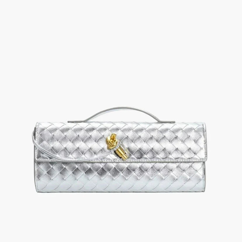 Colette Evening Clutch vegan leather bag held in hand