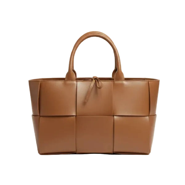 Front view of Aurelia caramel genuine leather tote bag with woven texture, leather handles, and tie closure