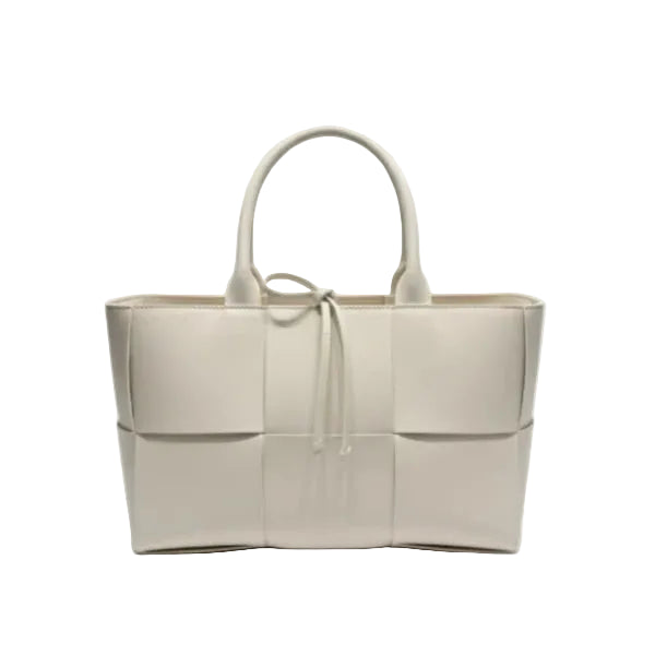 Front view of Aurelia off-white genuine leather tote bag with woven texture, leather handles, and tie closure