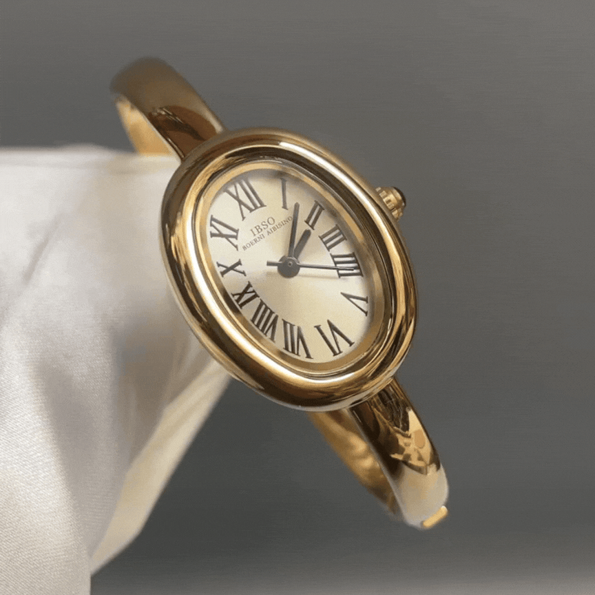 gold bangle watch for women
minimalist bracelet watch
elegant jewelry style watch