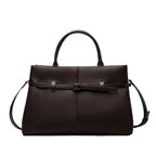 Front view of a brown coffee-colored genuine leather tote bag with a sleek buckle design, perfect for formal and casual occasions