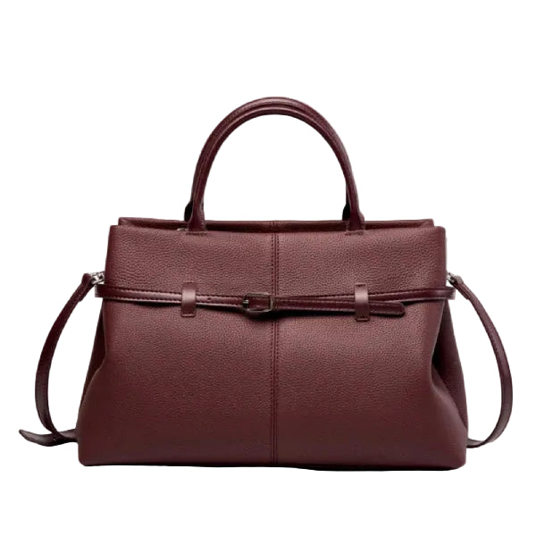 Front view of a wine red genuine leather tote bag with a sleek and sophisticated design, highlighted by the central buckle accent