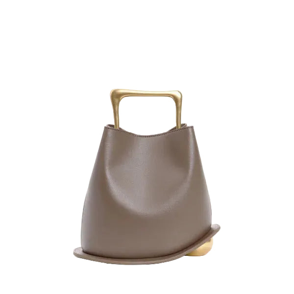 Front view of a Taupe Izelia top grain leather crossbody bag with a gold handle on a white background