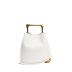 Front view of a White Izelia top grain leather crossbody bag with gold handle on a white background