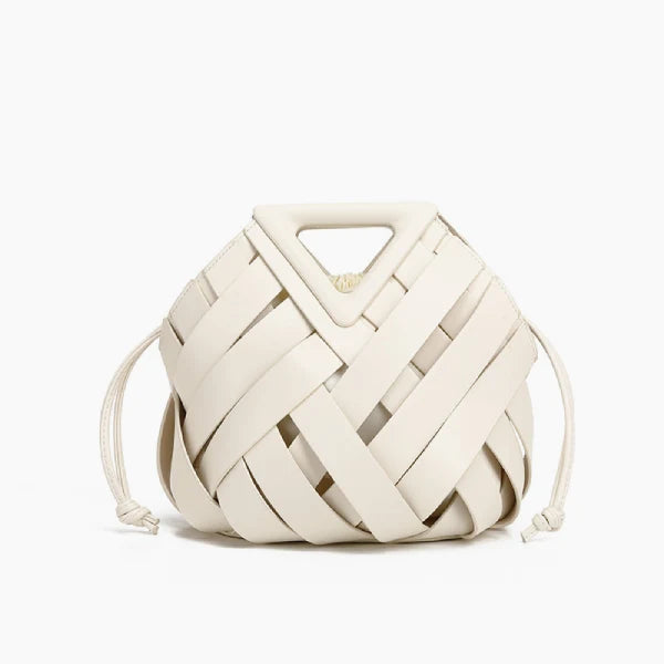 Seren Vegan Leather Bucket Bag in white, front studio view showing sculptural woven body with drawstring sides and triangle handle