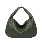 Front view of dark green woven vegan leather hobo bag with a spacious design, wide handle, and zipper opening