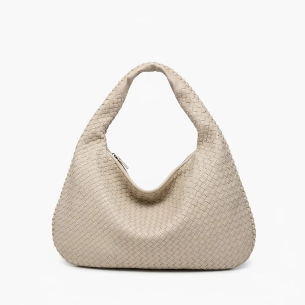 Front view of off-white woven vegan leather hobo bag with wide handle and zipper opening