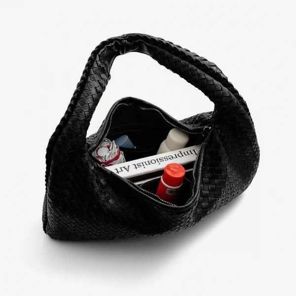 Valencia Vegan Leather Hobo Bag in black, top view showing wide zip opening and roomy interior with essentials inside